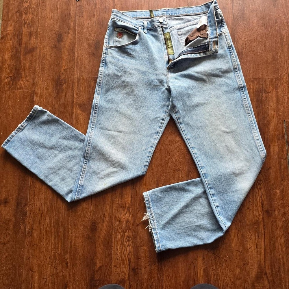 Light wash blue denim wrangler twenty x jeans